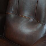 Very beautiful wing chair made of cowhide leather in English style