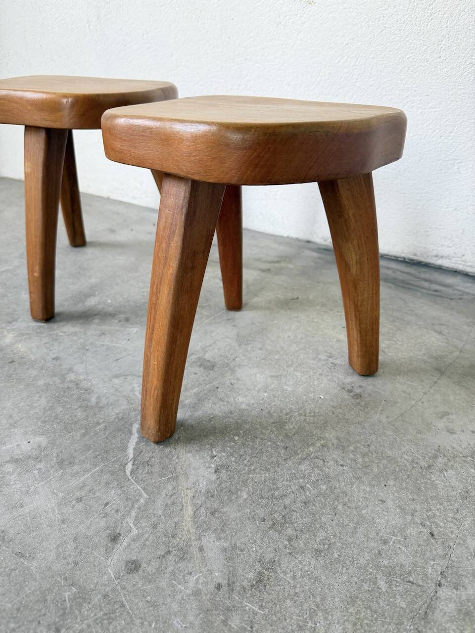 Pair of Henri Bataille oak stools