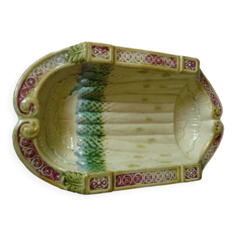 Old asparagus dish in saline slip fixed cradle