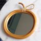 Vintage rattan apple mirror
