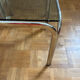 Duo de tables basses chrome et verre fumé
