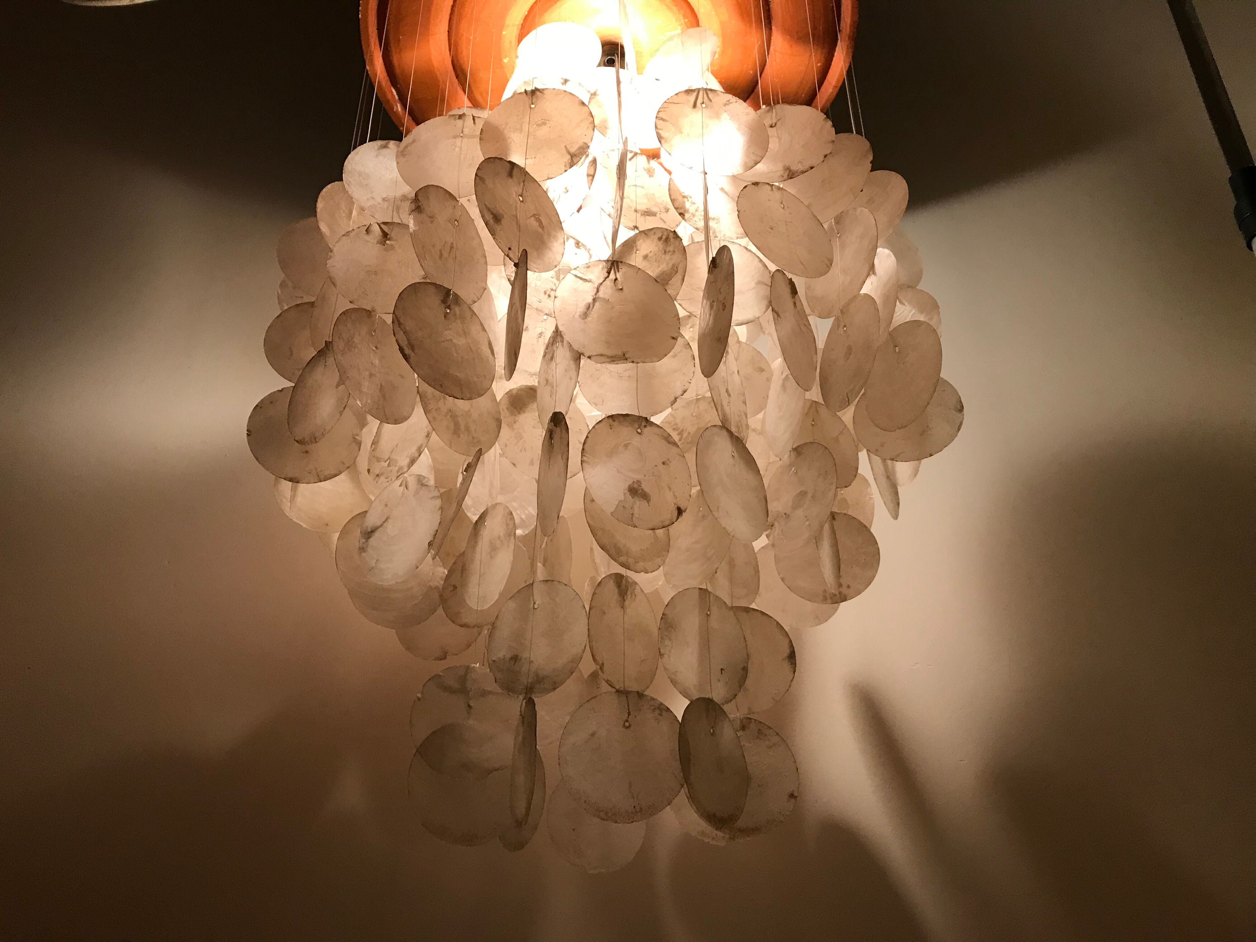 Suspension with mother-of-pearl stamps