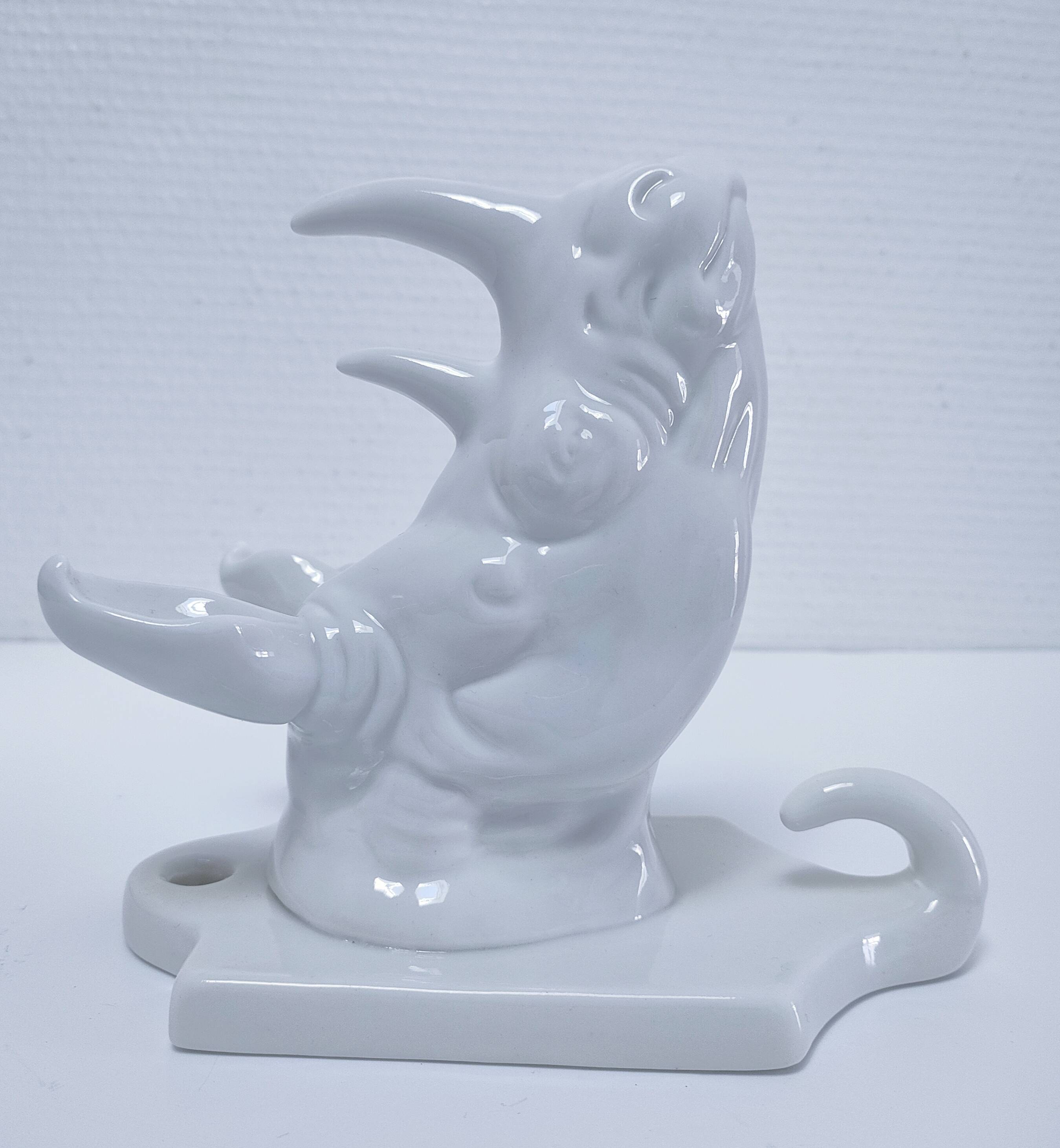Porcelain rhinoceros design coat rack