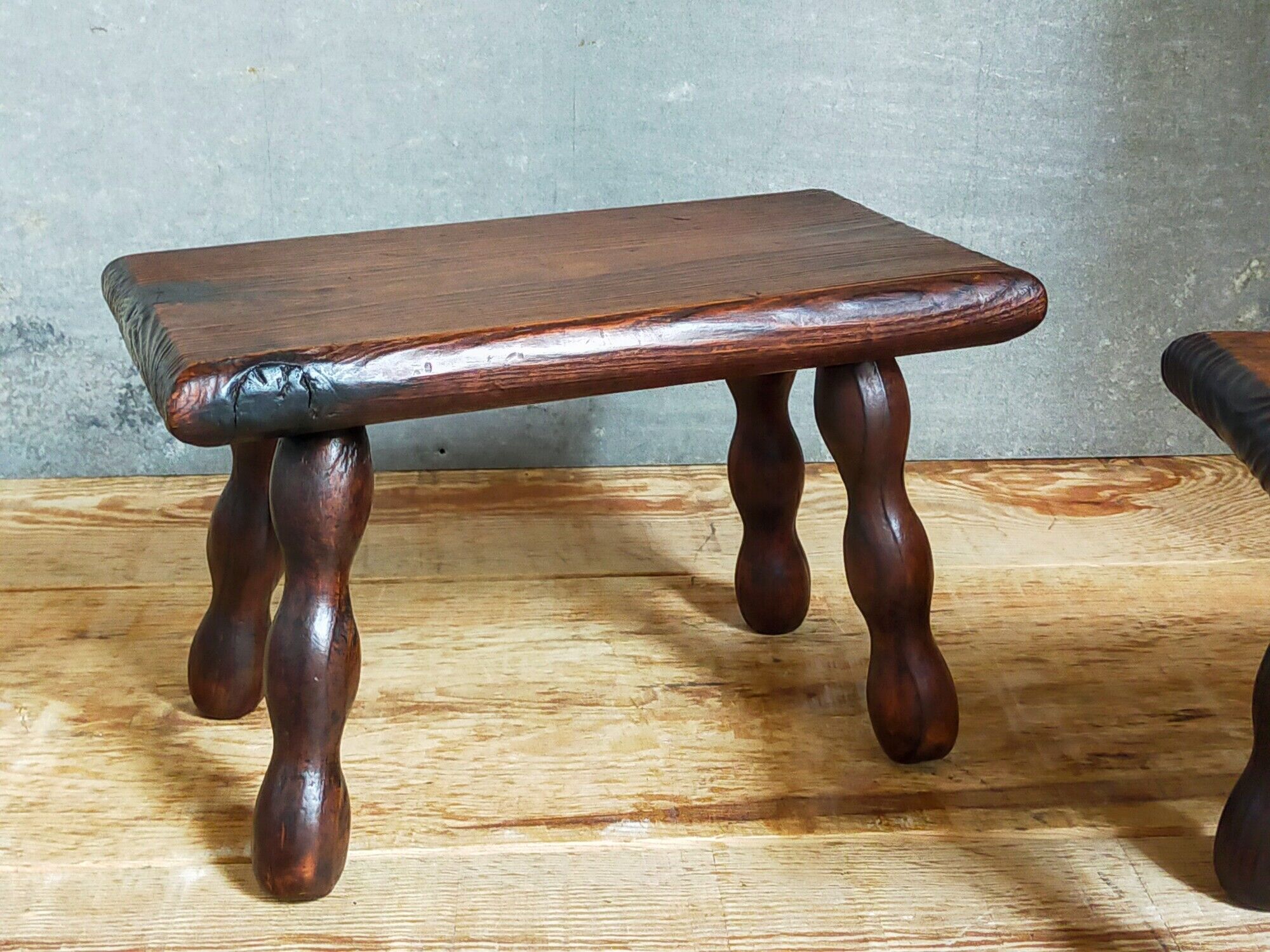 Pair of vintage solid turned wood footstools