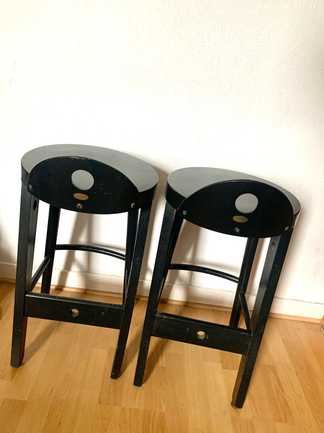 Pair of black designer stools by Baumann