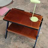 Vintage console design, sleek from the 1960s-70s.