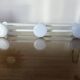 White lacquered metal wall coat rack with 3 hooks, 1980