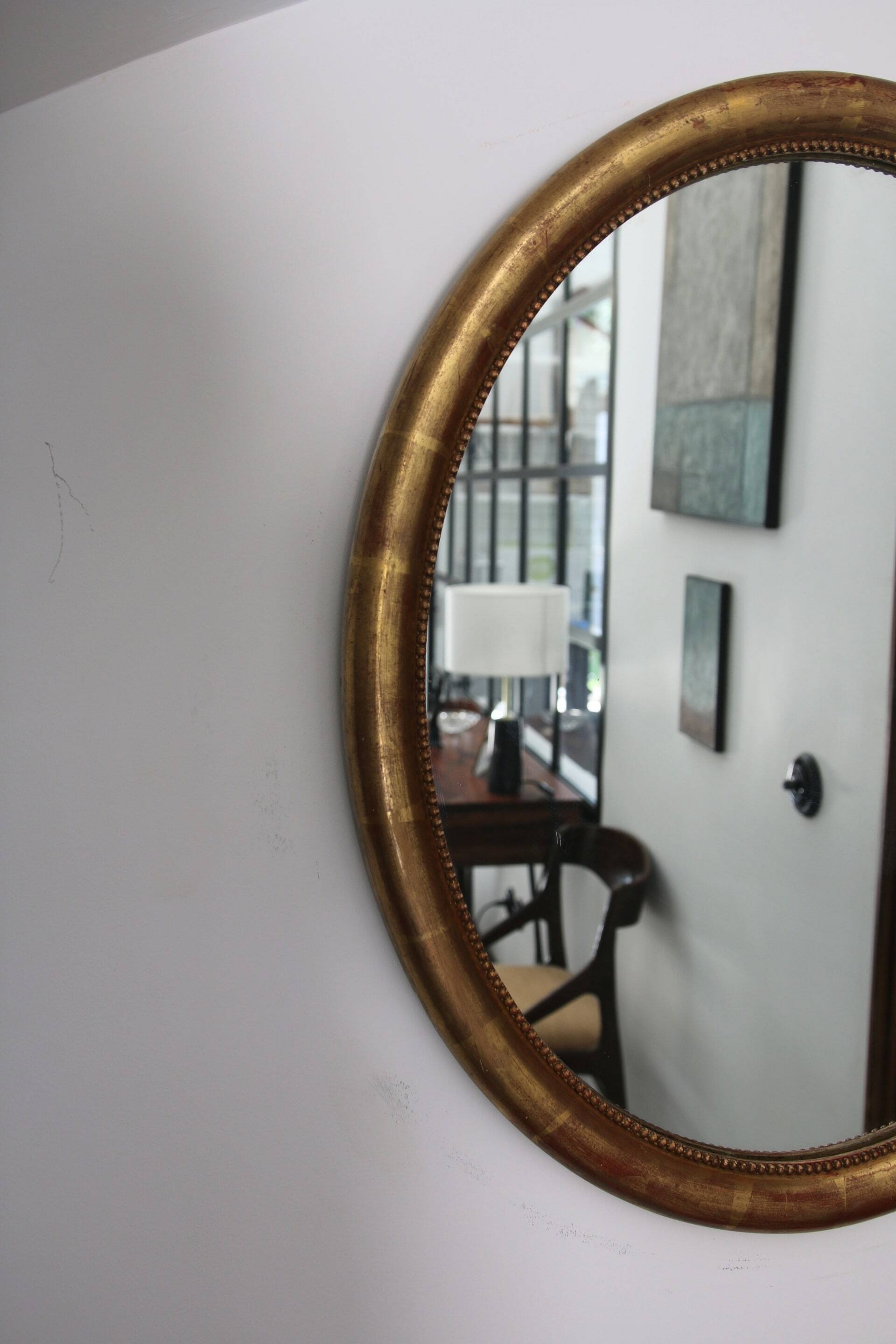 Oval mirror with gilded wood, Napoleon III medallion.