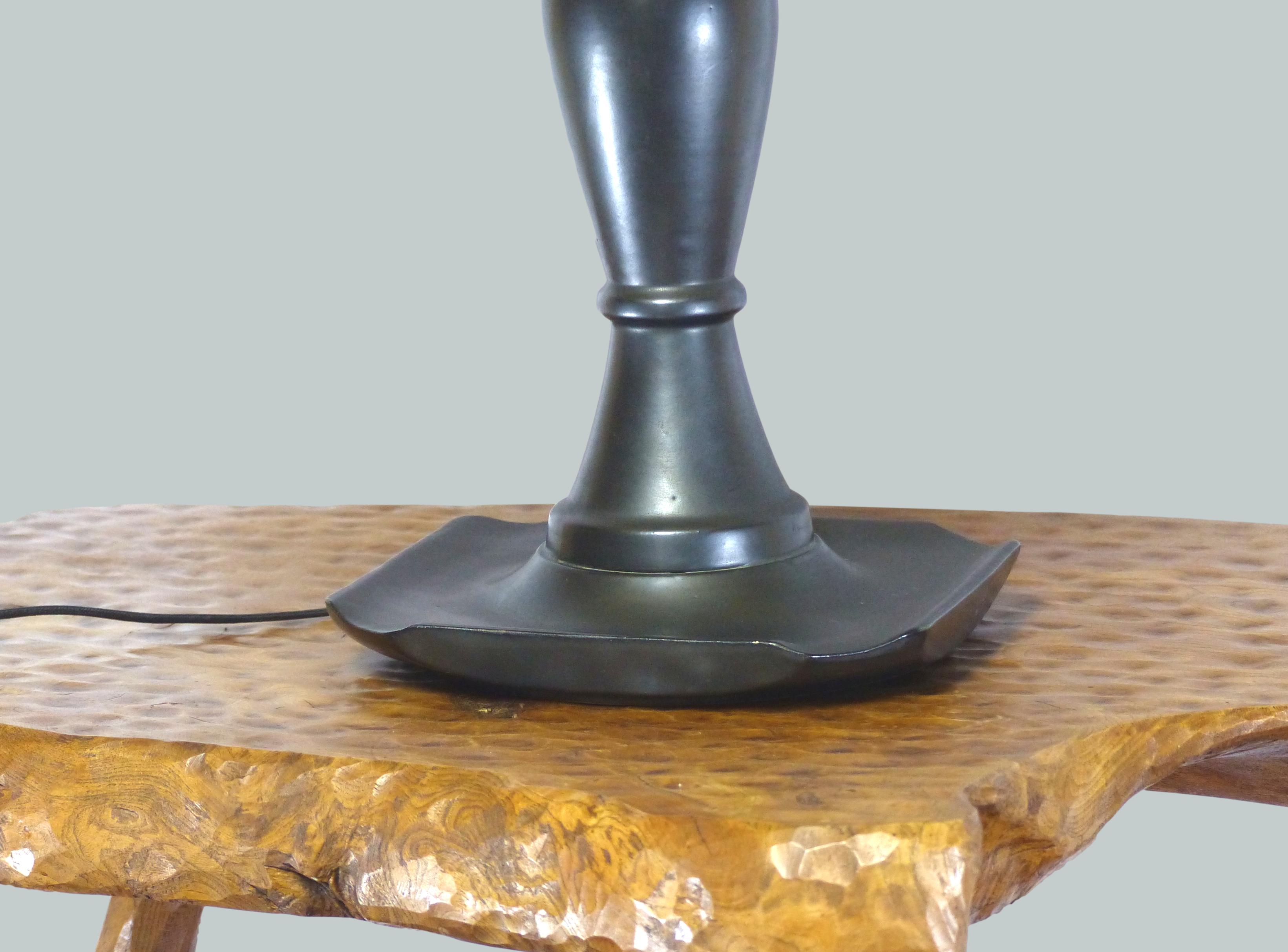 Baluster lamp in glossy black enamelled earthenware