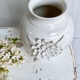 Small ceramic vase with floral relief