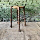 High stool in turned wood
