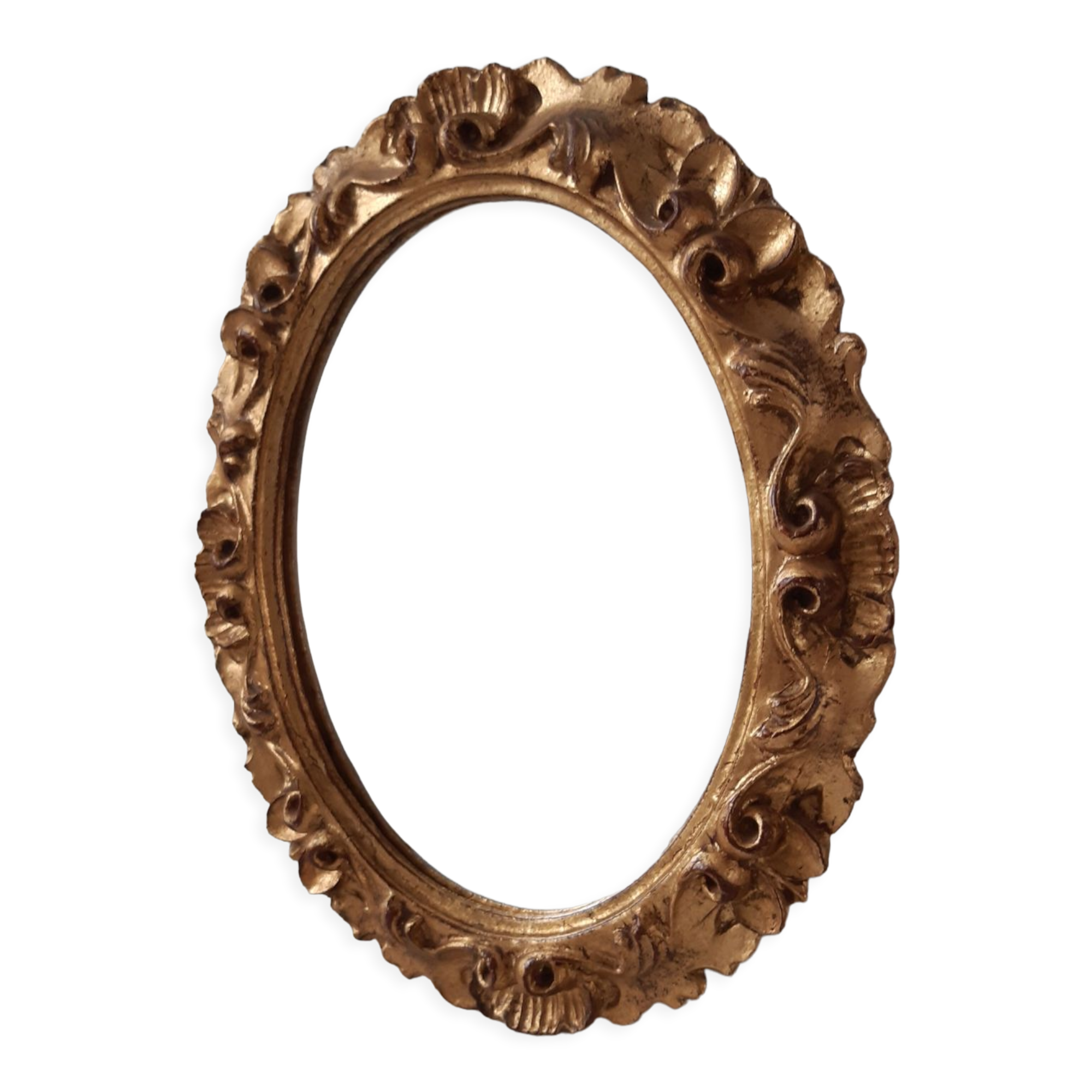 Old mirror in gilded wood late nineteenth