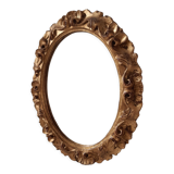 Old mirror in gilded wood late nineteenth