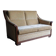 Two-seater Art Deco sofa with ornate wooden details.