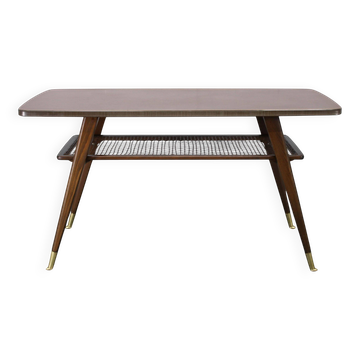 Mid-century German coffee table with rattan shelf and brass legs