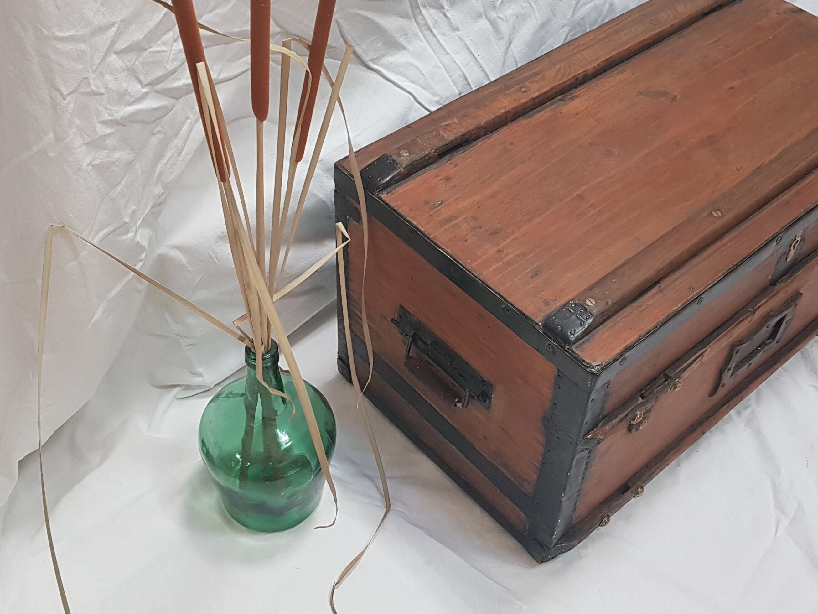 Former wooden travel trunk