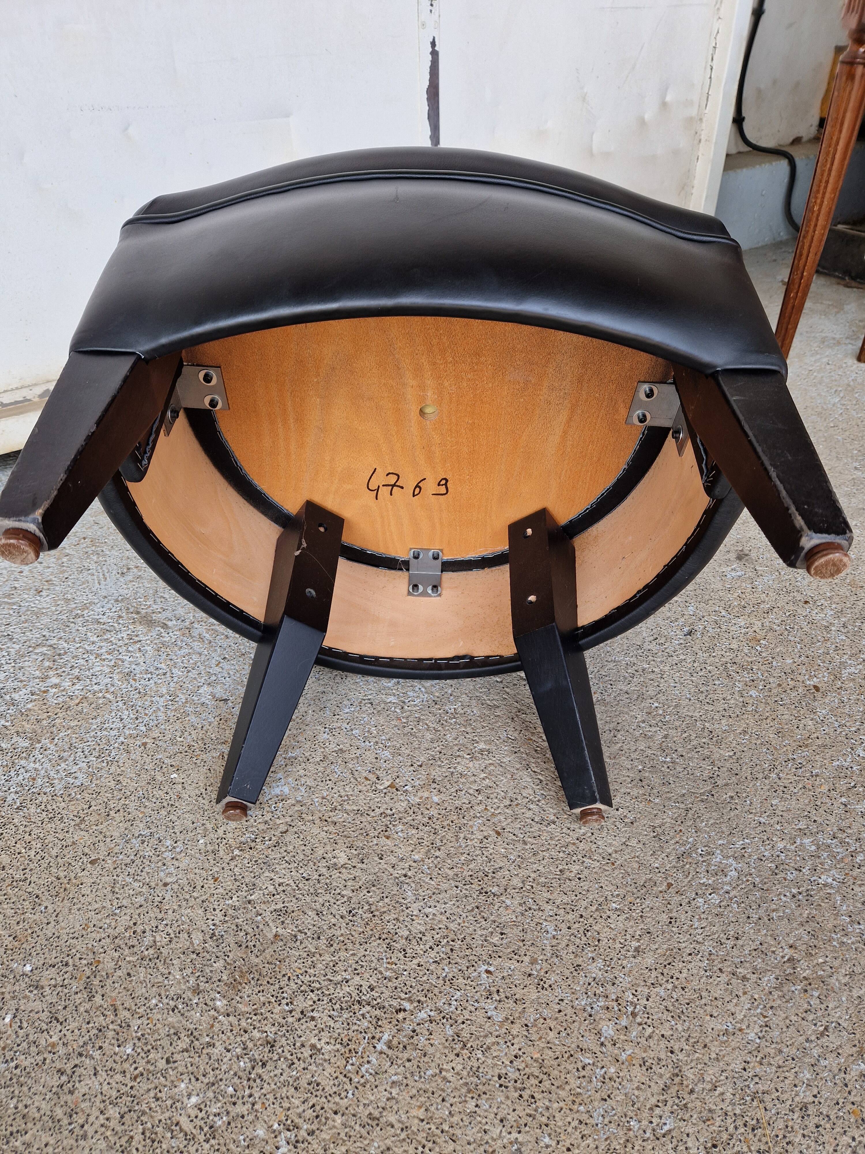 Pair of armchairs in imitation leather