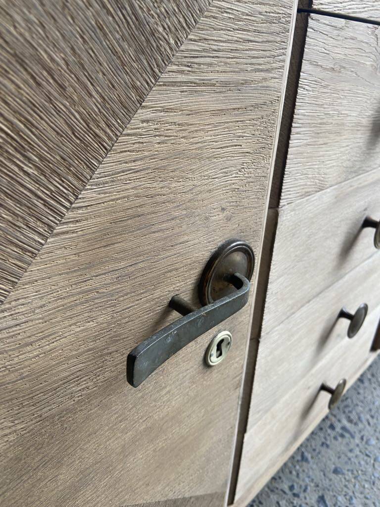 Raw wood chest of drawers with marble top