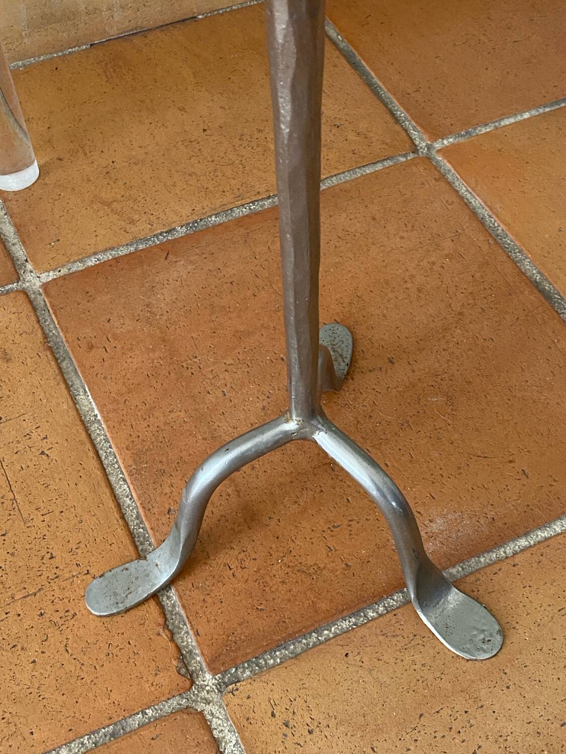 Large silver-plated candlestick on a stand
