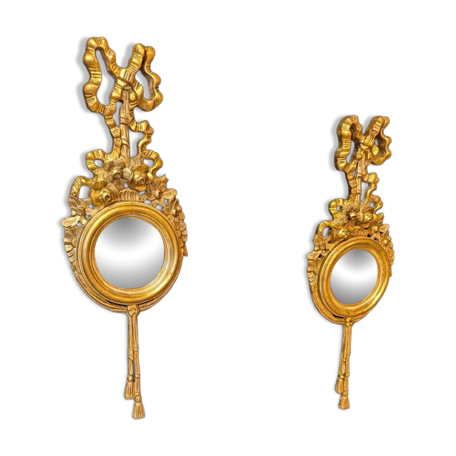 Pair of round Louis XVI style giltwood mirrors