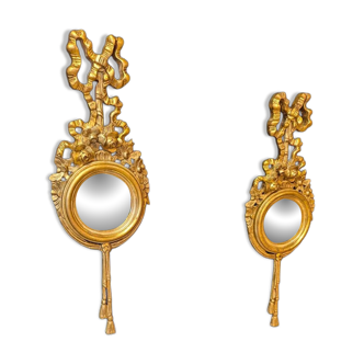 Pair of round Louis XVI style giltwood mirrors