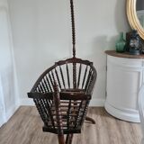 Old wooden rocking cradle twisted / vintage bars