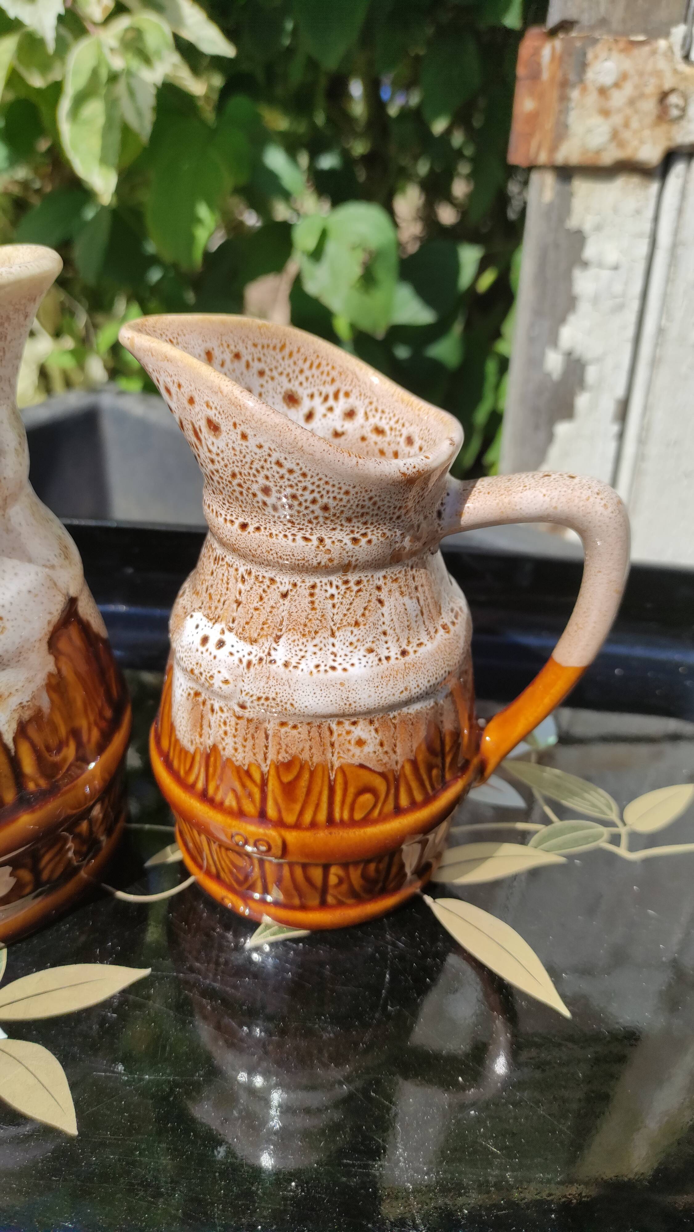 Duo of vintage pitchers Revol