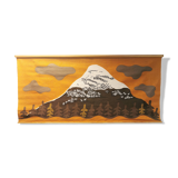 Beautiful wall-mounted Swedish fabric print with motifs of mountains, reindeer and more.