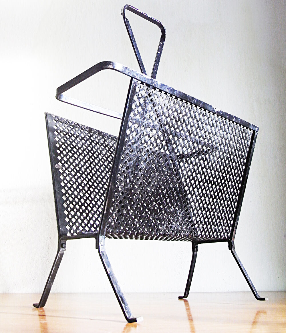 Black magazine door Mathieu Mategot in perforated metal 50s