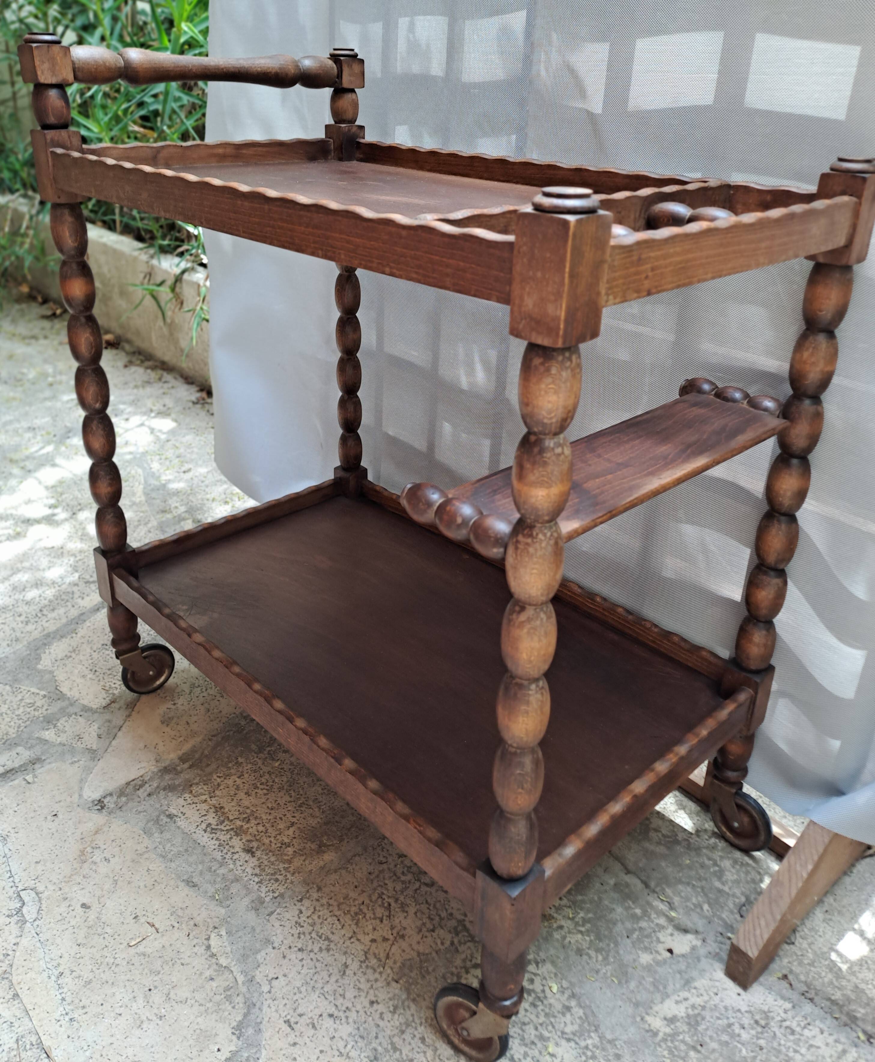 Dessert, table with wheels, side table in solid wood stained brown color France 1960
