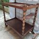Dessert, table with wheels, side table in solid wood stained brown color France 1960