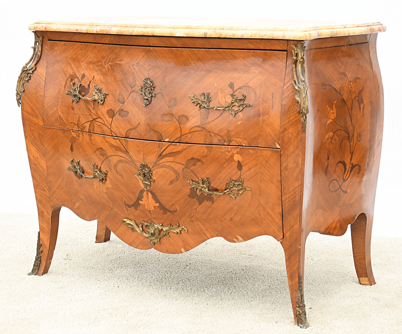 Curved chest of drawers in Louis XV style
