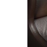 Brown leather wingback chair in mid-century modern Danish style, 1960s.