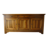 Very much in solid walnut, 3 doors.