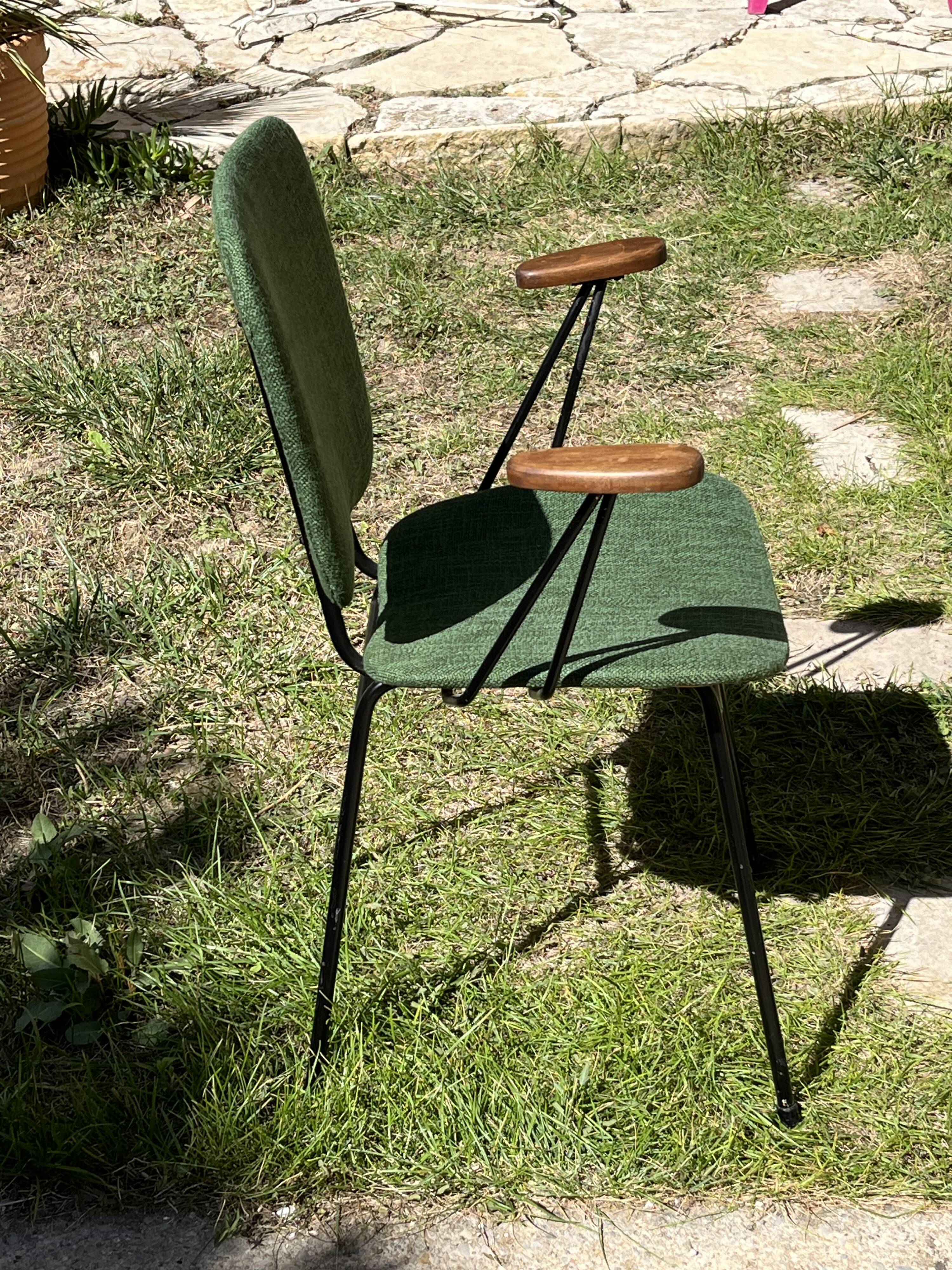 50s chair with armrests.