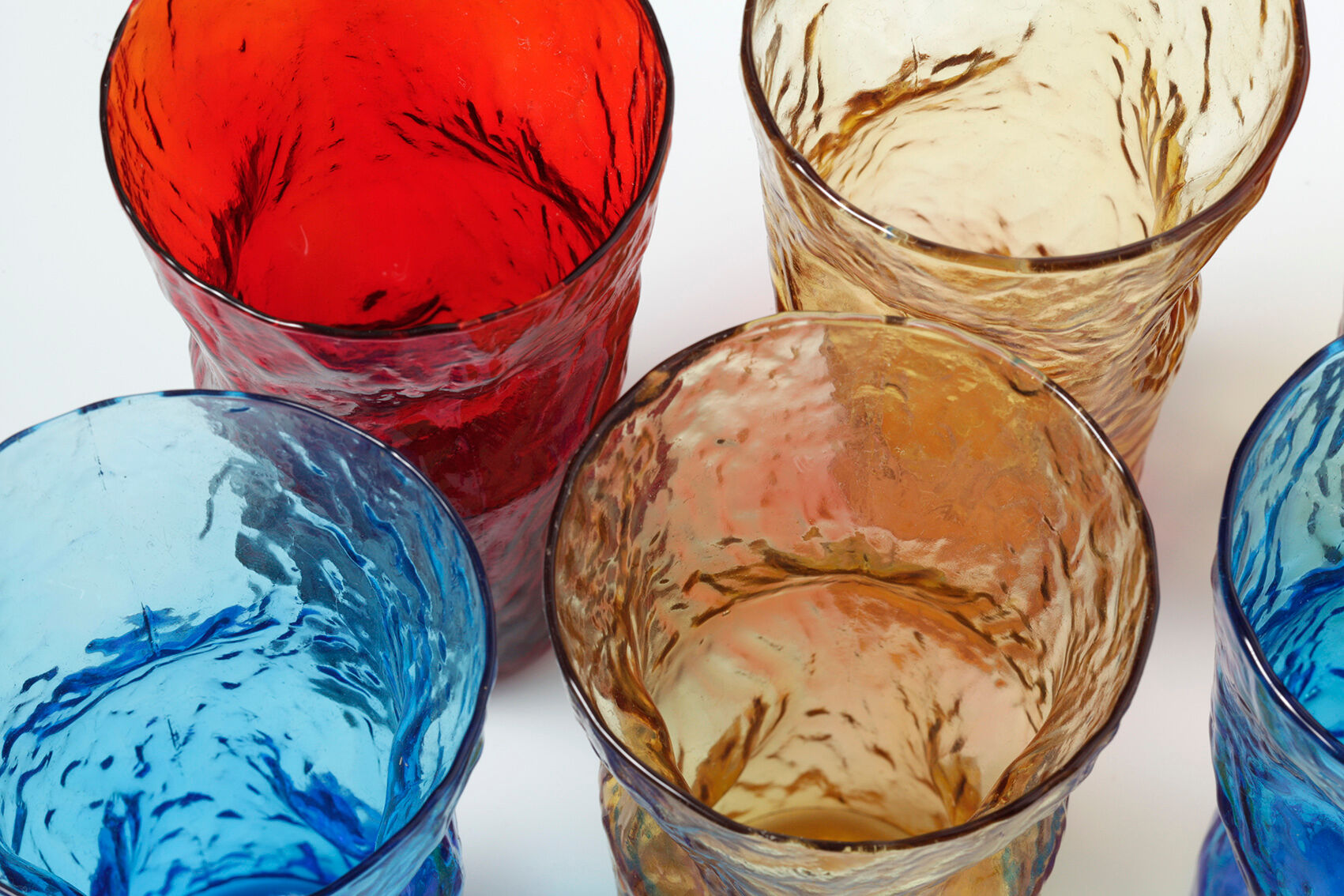 Carafe and 6 zoomorphic glasses in colored molded glass