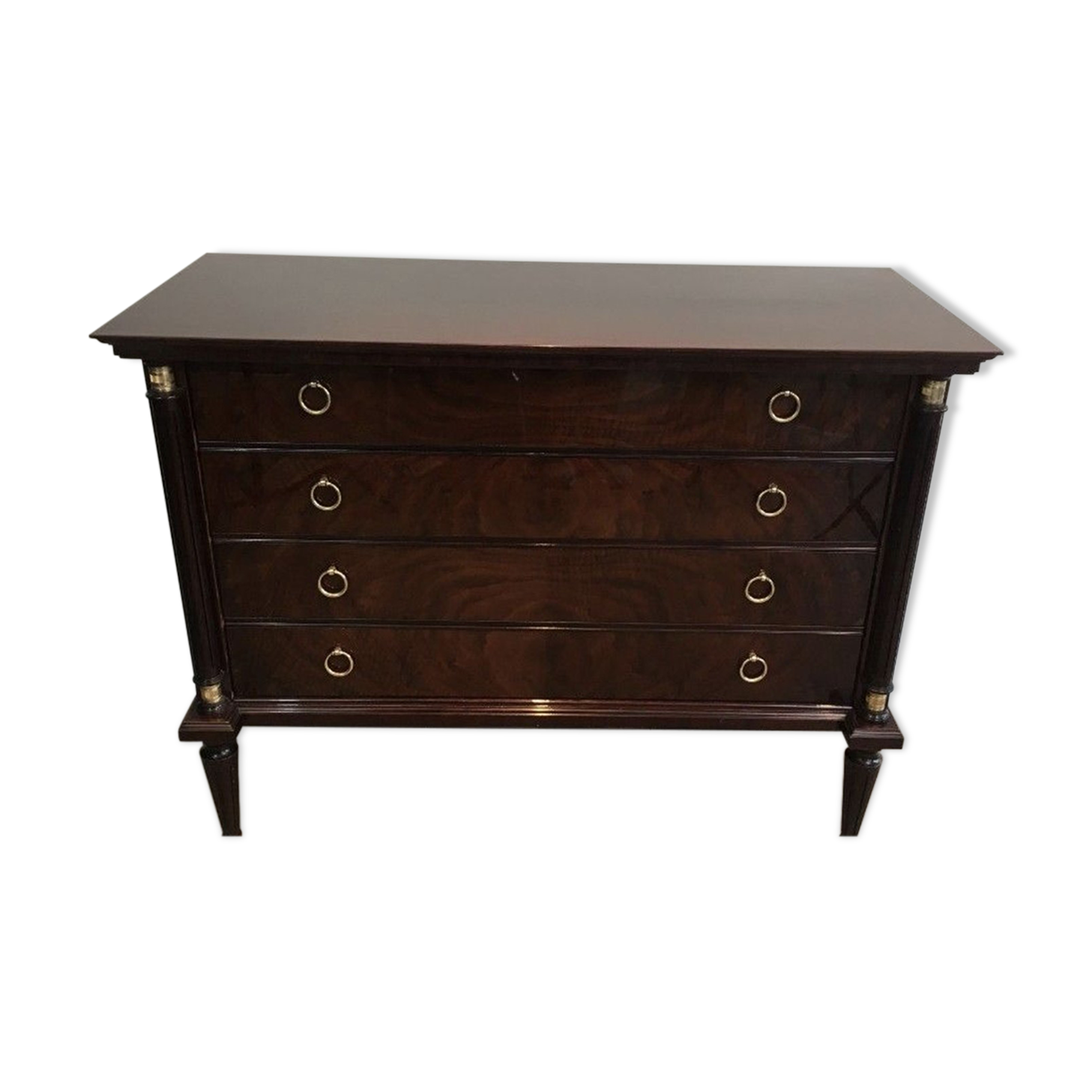 Neoclassical chest of drawers in mahogany and brass