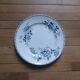 Round service dish in St Amand iron earth and Hamage model Acacia