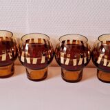 Carafe and its amber/gold glasses from the 70s