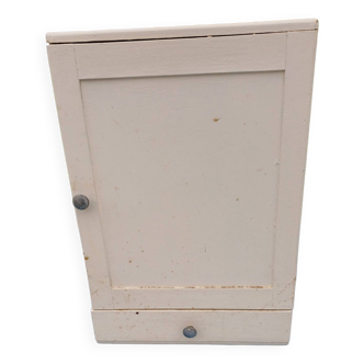 Small white limed wood storage cabinet