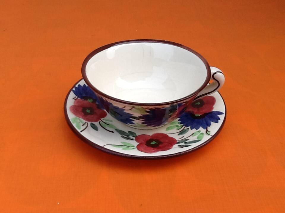 Earthenware Breakfast Cup / Saucer with floral decoration