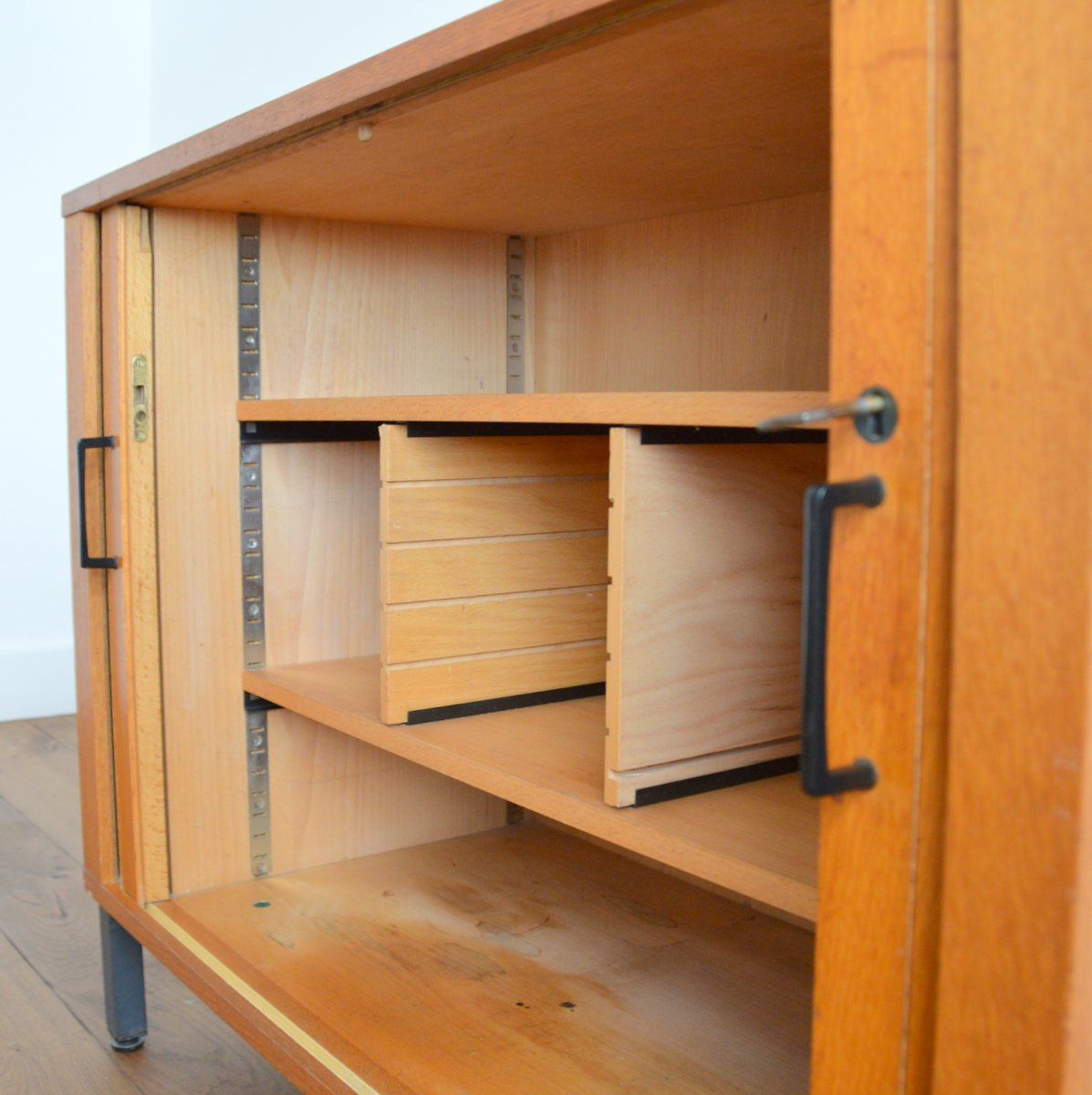 Storage cabinet with sliding curtain shutter 1950s