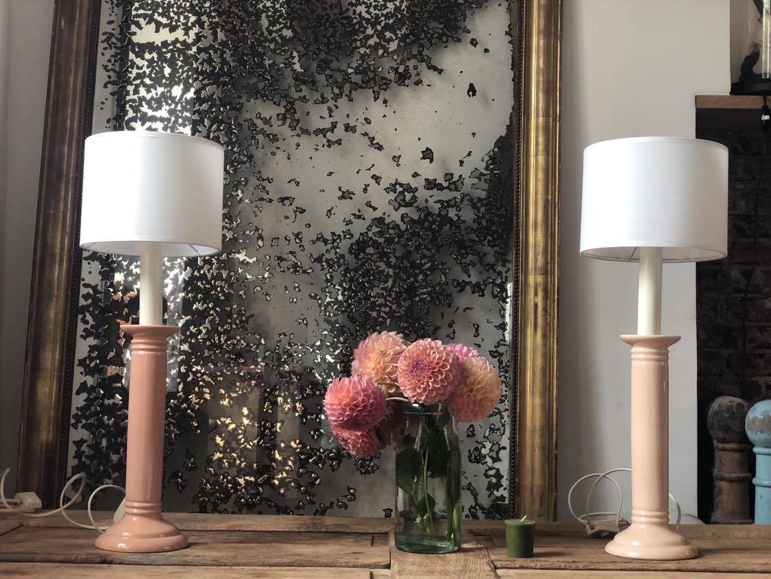 Pair of vintage salmon pink candlestick shaped ceramic lamp bases