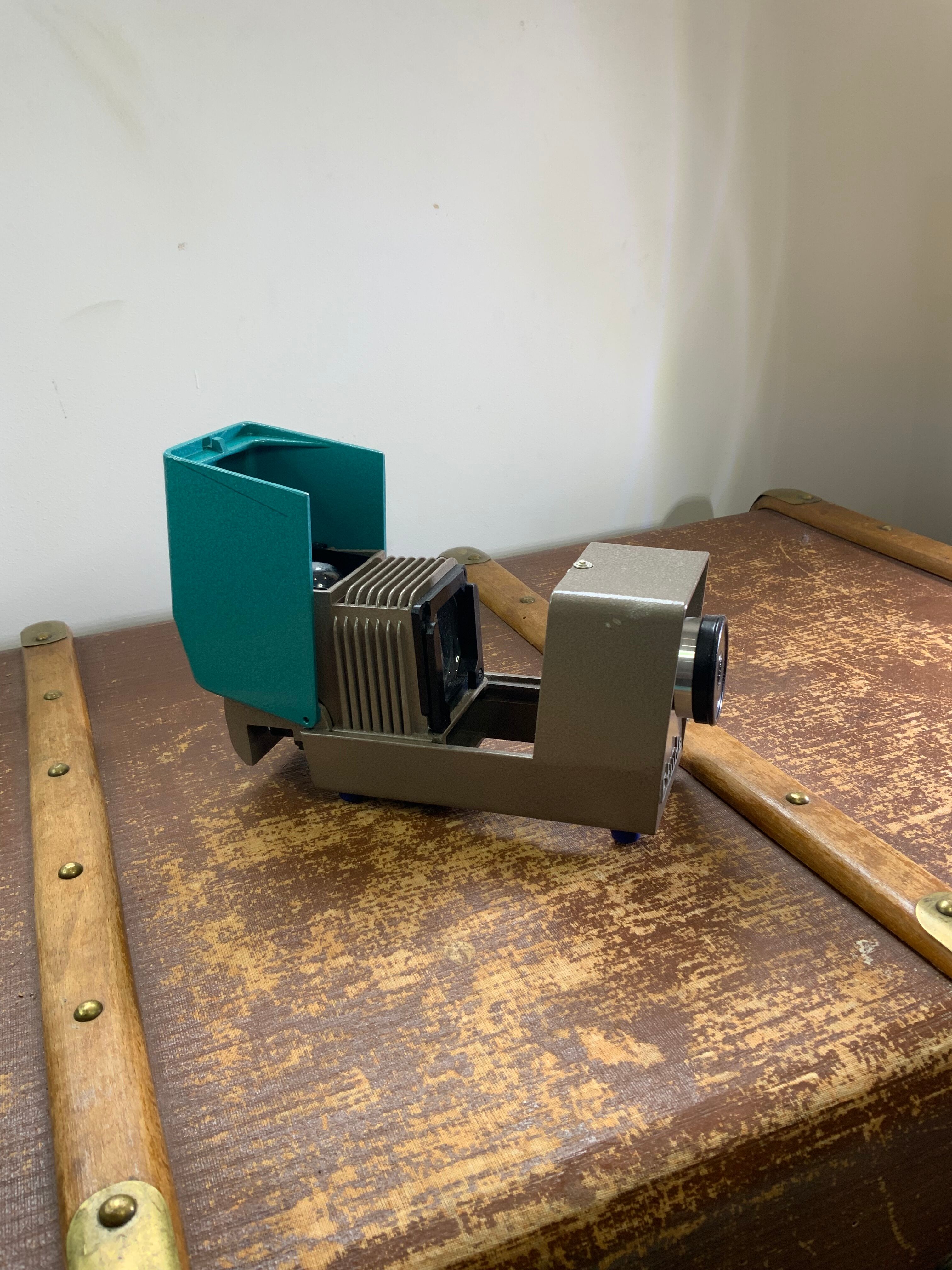 Vintage USSR slide projector in metal enamel blue and gray brand Optical study bulb