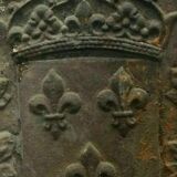 Plaque de cheminée en fonte de fer Décorde blason couronné XIX siècle