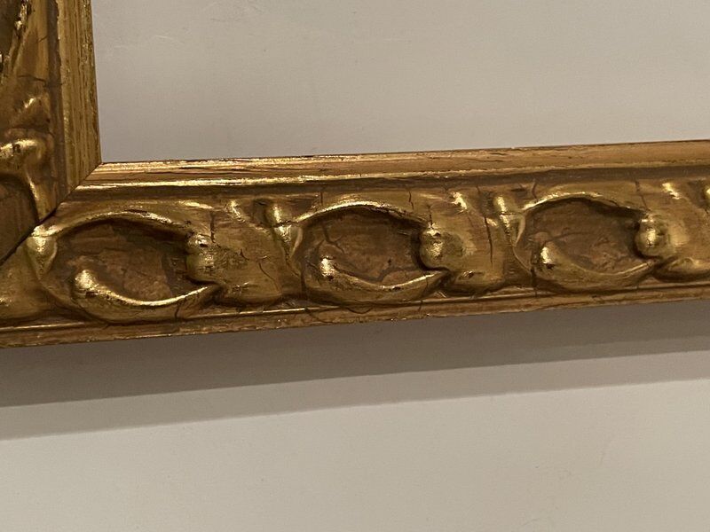 Old frame with gilded moldings