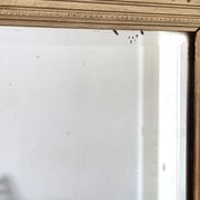 Miroir ancien doré richement sculpté