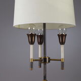 Modernist table lamp in black and gold lacquered metal