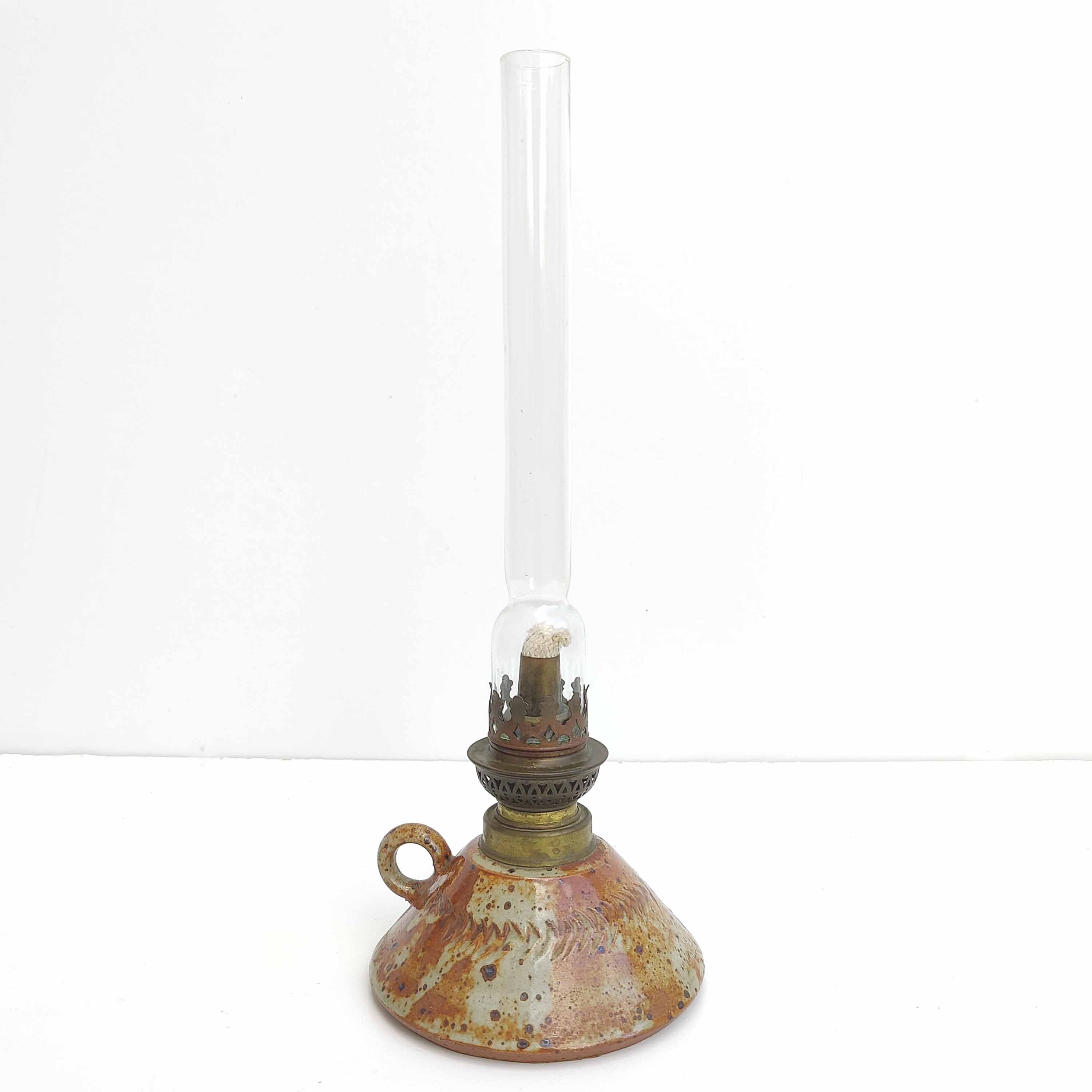 Oil lamp sandstone signed