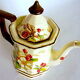 Coffee maker in earthenware decorated with hawthorn flowers, from the house Villeroy--Boch, model "Portobello"